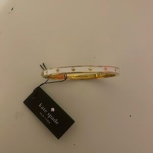 Kate Spade white enamel hinged bangle